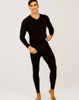 Person wearing black leggings on a white background