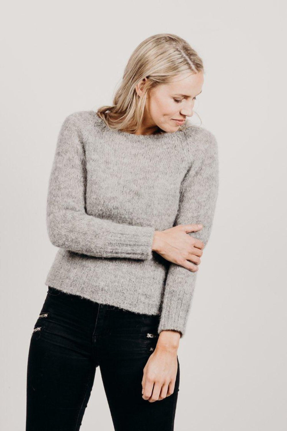 Woman wearing Brushed Alpaca Sweater with black pants