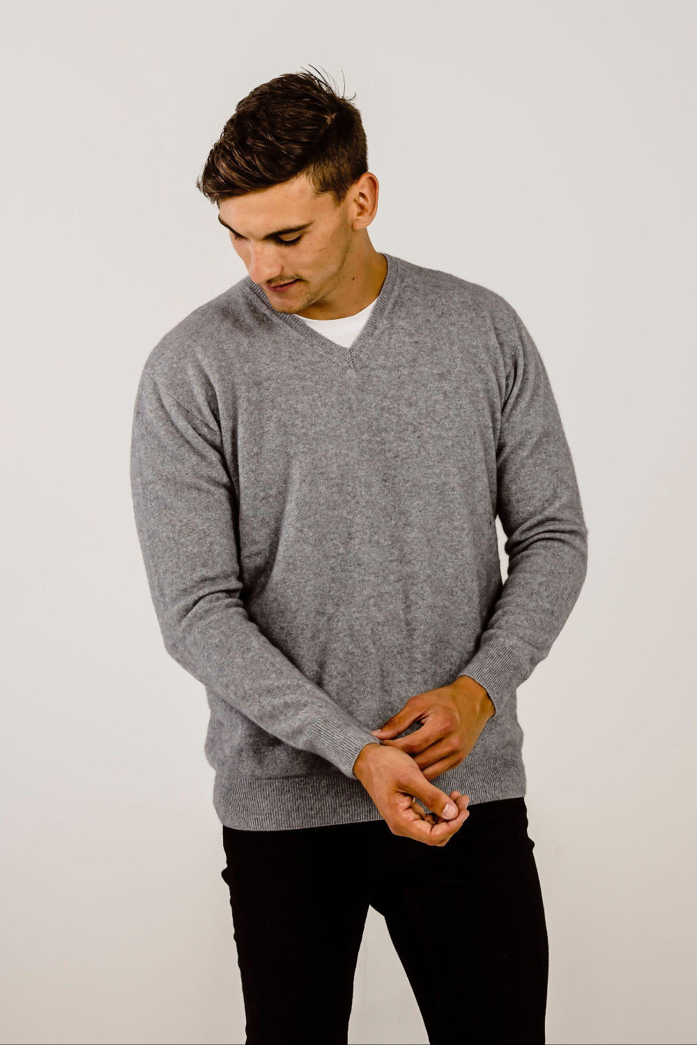Man wearing a grey Cashmere V Neck Sweater - Kapeka NZ