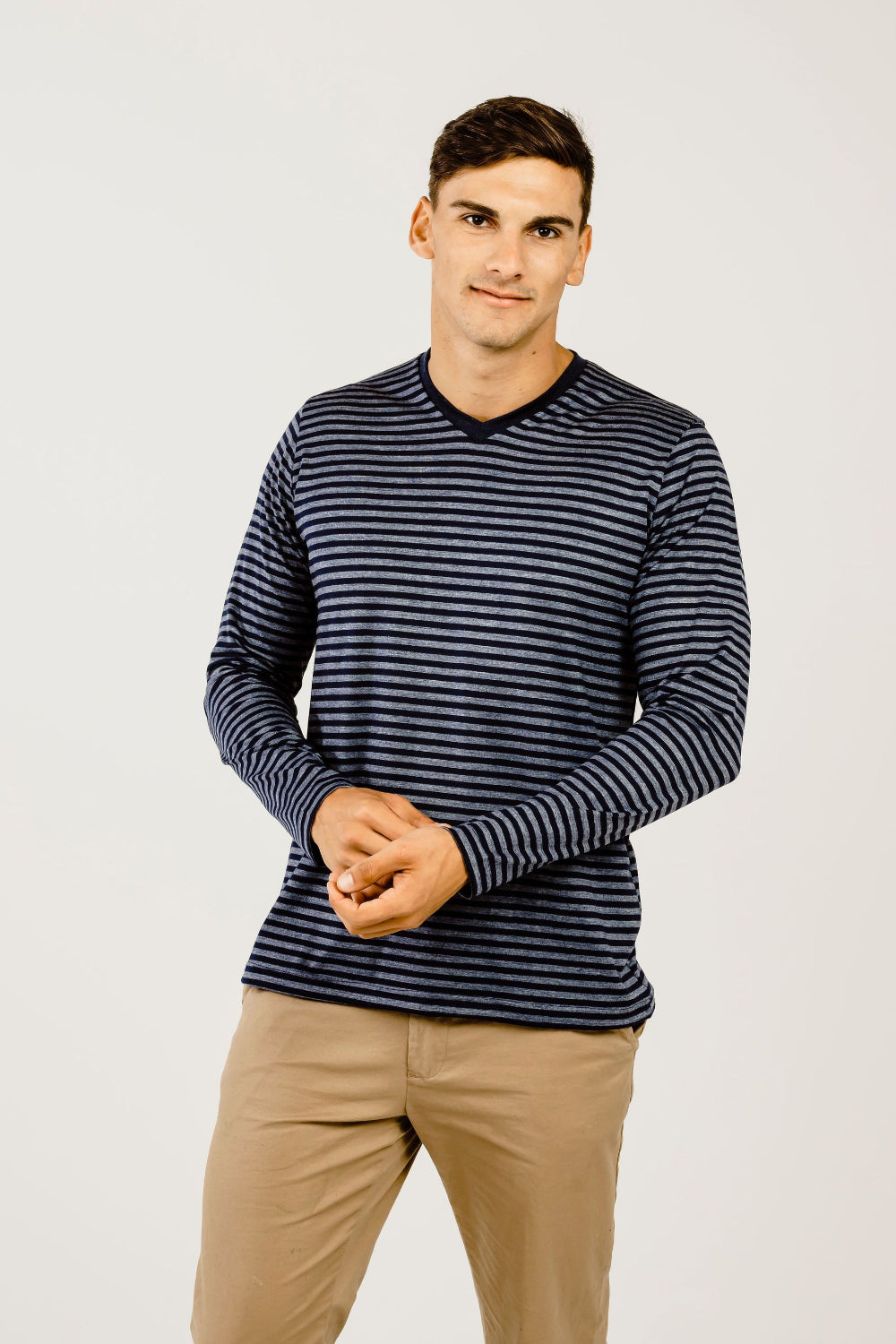 Man wearing a Striped Merino V Neck Long Sleeve T-Shirt - Kapeka NZ