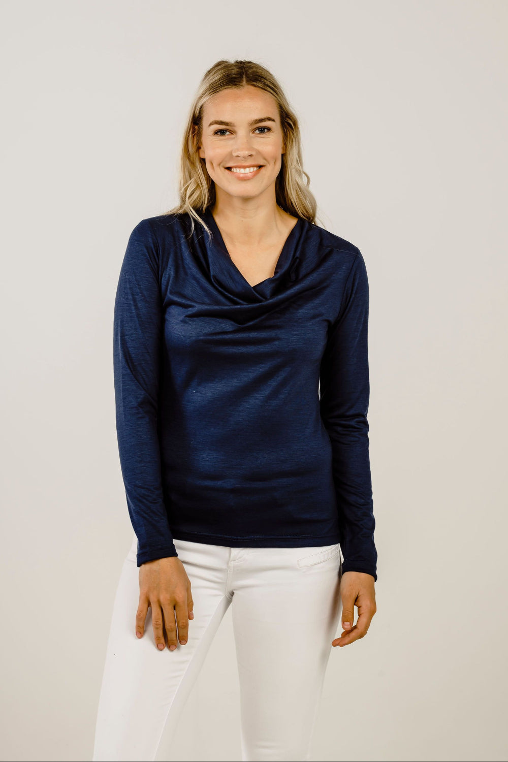 Woman wearing a navy Merino Cowl Neck - Kapeka NZ