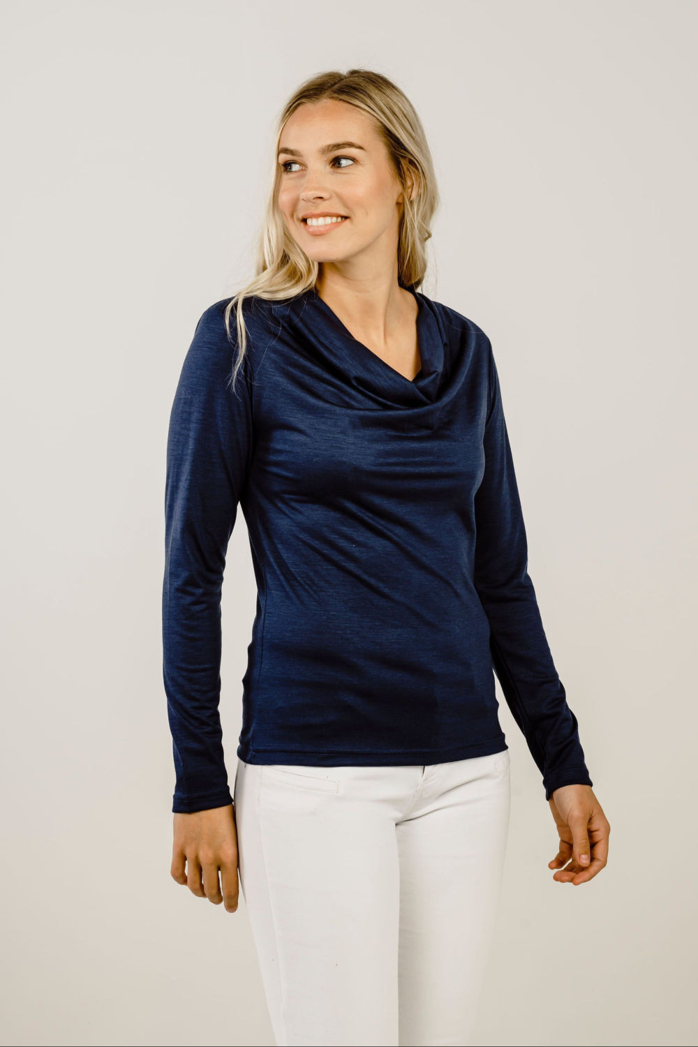 Woman wearing a navy Merino Cowl Neck - Kapeka NZ