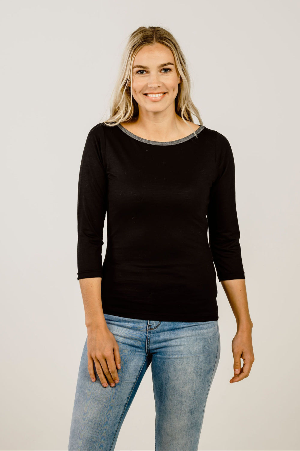 Woman wearing black Merino Boat Neck Shirt - Kapeka NZ